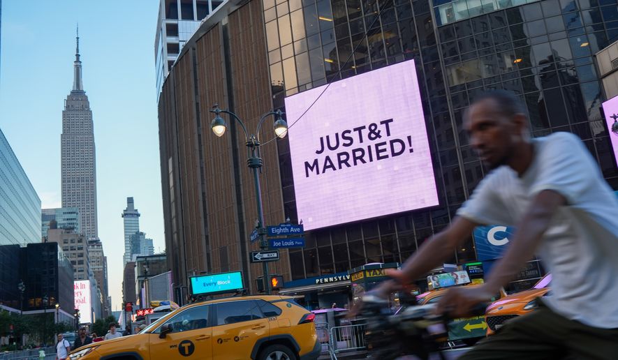 A "Just Married" sign is displayed on Madison Square Garden during a wedding between singer Taylor Swift and National Football League player Travis Kelce on Friday, July 3, 2026, in New York. (AP Photo/Ryan Murphy)