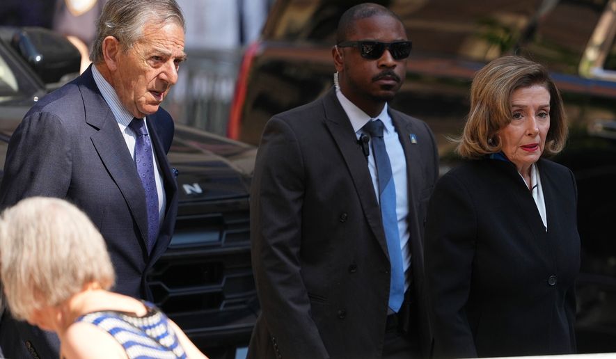 Rep. Nancy Pelosi, D-Calif., and her husband Paul arrive at the funeral services for Clive Davis at Central Synagogue in New York, Monday, June 29, 2026. (AP Photo/Adam Gray)