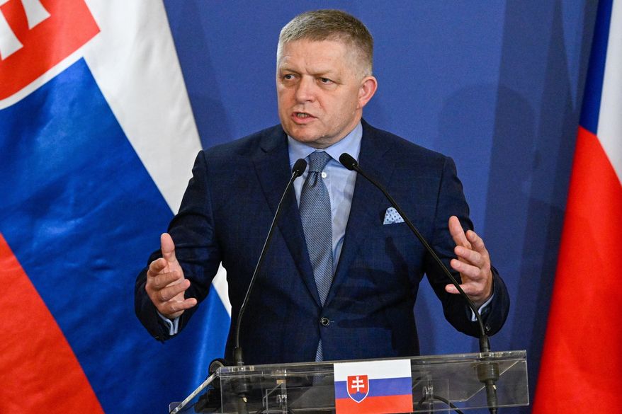 Slovakia's Premier Robert Fico attends a joint press conference with his Polish, Czech and Hungarian counterpart to conclude the one-day the summit of the Visegrad Group (V4) countries in the Royal Castle in Godollo, northern Hungary, Tuesday, June 23, 2026. (Robert Hegedus/MTI via AP)