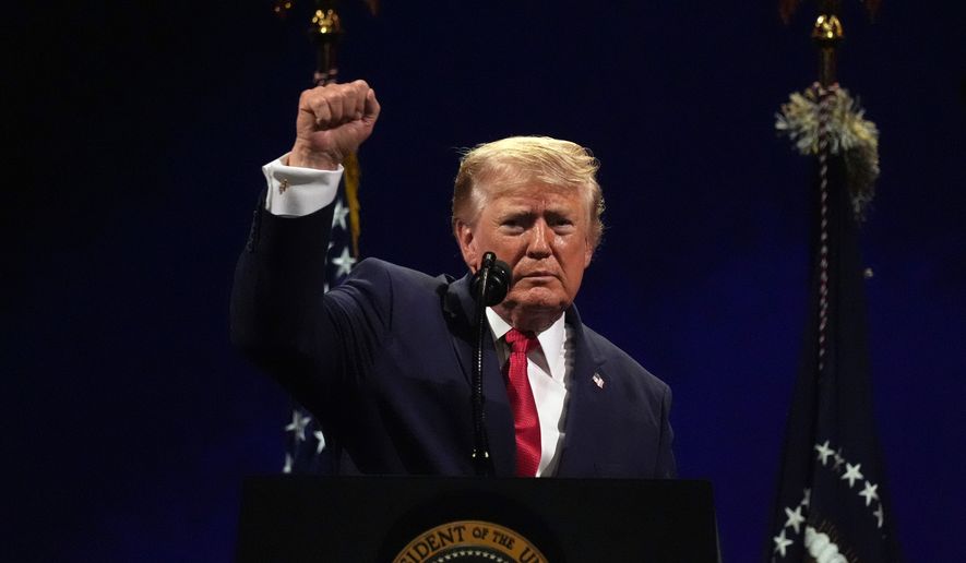 President Donald Trump gestures at the conclusion of his speech during Salute to America, an Independence Day event honoring the nation's 250th anniversary, Saturday, July 4, 2026, on the National Mall in Washington. (AP Photo/Mark Schiefelbein)