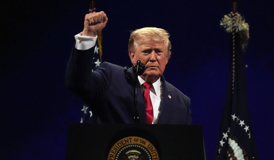 President Donald Trump gestures at the conclusion of his speech during Salute to America, an Independence Day event honoring the nation's 250th anniversary, Saturday, July 4, 2026, on the National Mall in Washington. (AP Photo/Mark Schiefelbein)