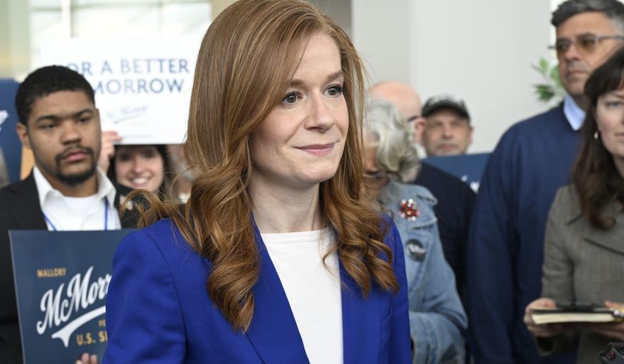 FILE - Michigan State Sen. Mallory McMorrow, D-Royal Oak, a candidate for the U.S. Senate, listens to questions from the media during the Michigan Democratic Party State Endorsement Convention, April 19, 2026, in Detroit. (AP Photo/Jose Juarez, File)
