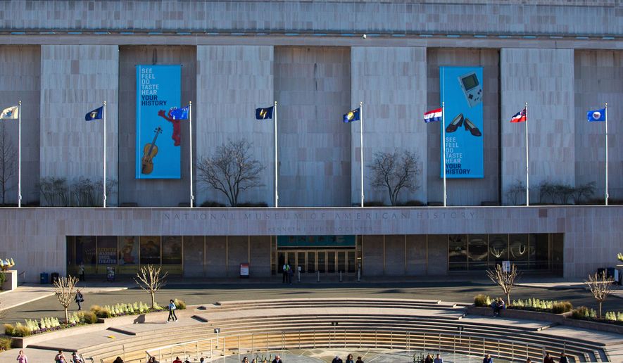 FILE - The Smithsonian Museum of American History is pictured on the National Mall in Washington, April 3, 2019. (AP Photo/Pablo Martinez Monsivais, File)