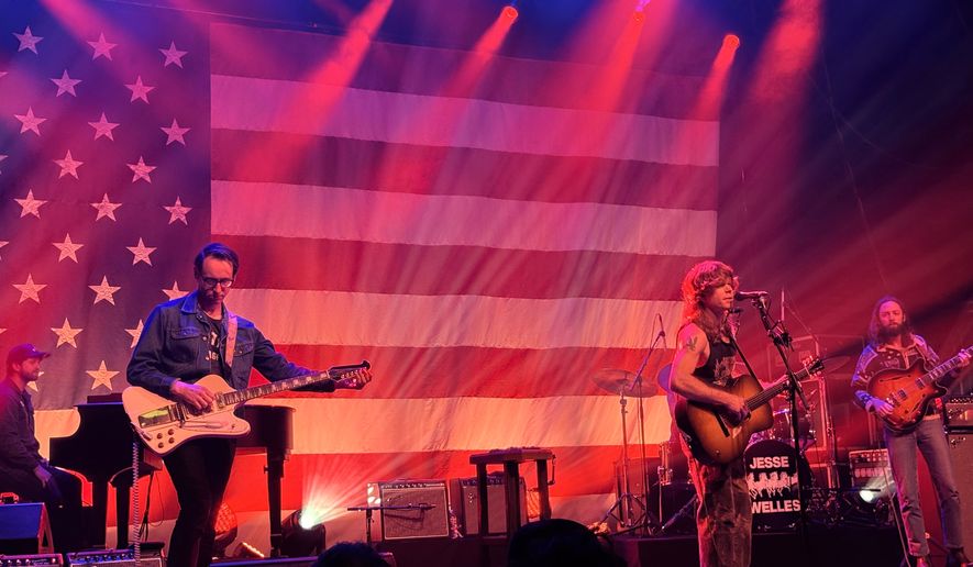 Singer-songwriter Jesse Welles performs with members of his band in Detroit, March 10, 2026. (AP Photo/Ted Anthony)