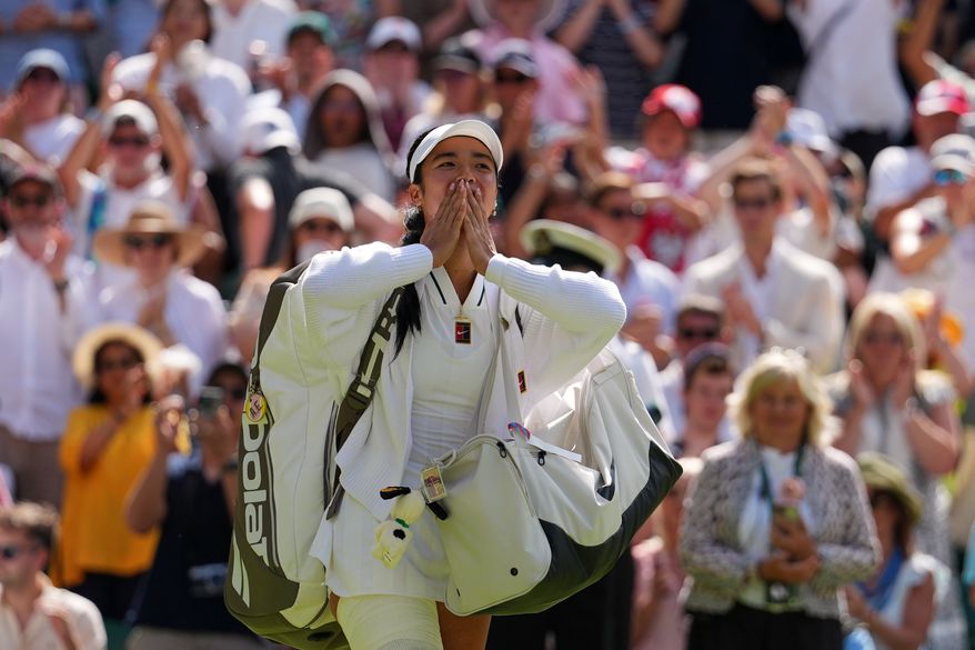 Alexandra Eala of the Philippines blows kisses to the crowd after losing the women's singles fourth round match against Jasmine Paolini of Italy at the Wimbledon Tennis Championships in London, Monday, July 6, 2026.(AP Photo/Kirsty Wigglesworth)
