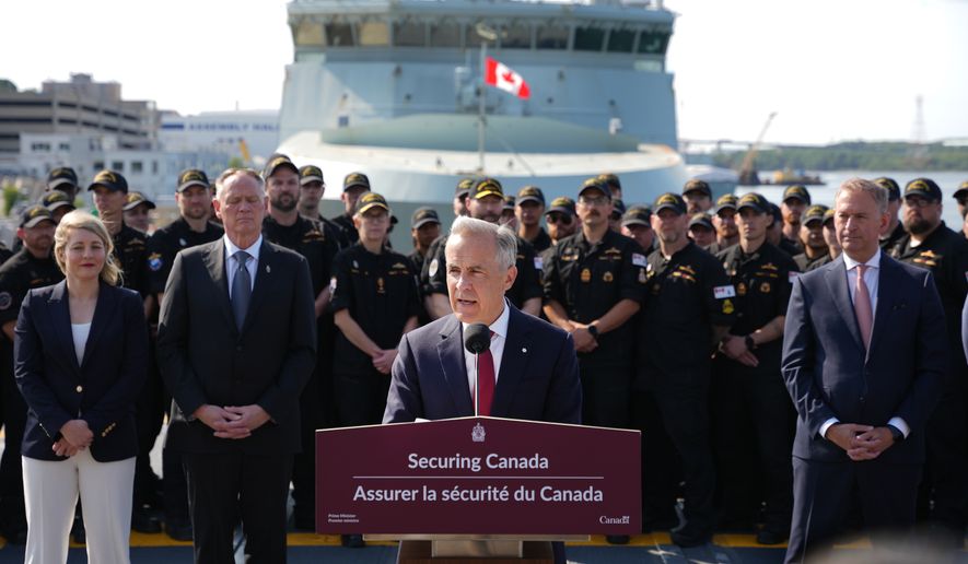 Canada Prime Minister Mark Carney makes an announcement at HMC Dockyard in Halifax on Monday, July 6, 2026. (Darren Calabrese/The Canadian Press via AP)