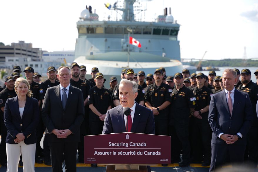 Canada Prime Minister Mark Carney makes an announcement at HMC Dockyard in Halifax on Monday, July 6, 2026. (Darren Calabrese/The Canadian Press via AP)