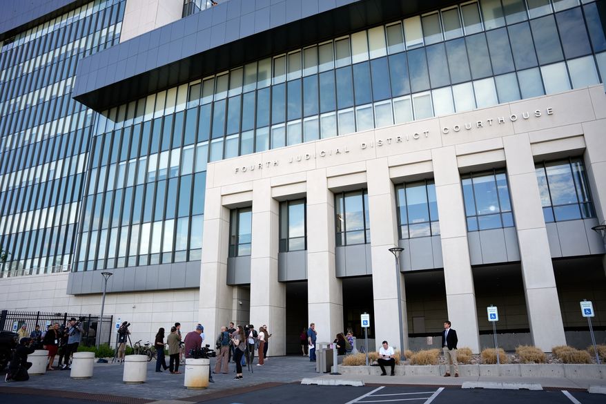 Media reporters wait outside the 4th District Courthouse, ahead of a hearing for Tyler Robinson, accused in the fatal shooting of Charlie Kirk, Monday, July 6, 2026, in Provo, Utah. (AP Photo/Marielle Scott)