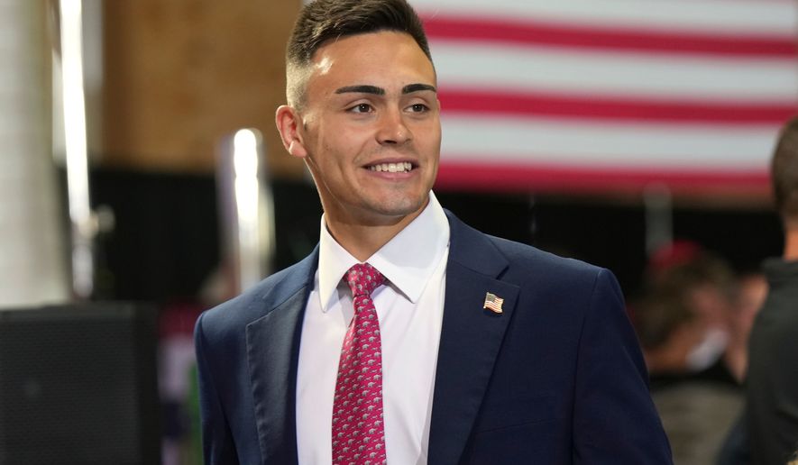 FILE - Michael Alfonso, a House candidate from Wisconsin, attends an event before President Donald Trump arrives to speak, Friday, June 5, 2026, in Chippewa Falls, Wis. (AP Photo/Glen Stubbe, File)