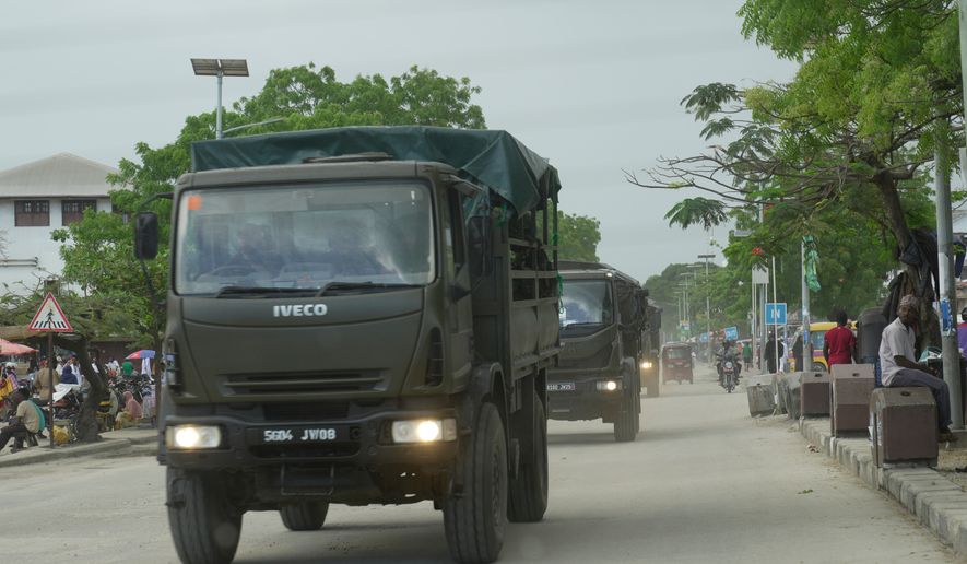 FILE - Tanzania Army patrol the street during vote counting in Zanzibar, Tanzania, Friday, Oct. 31, 2025. (AP Photo/Brian Inganga, File)