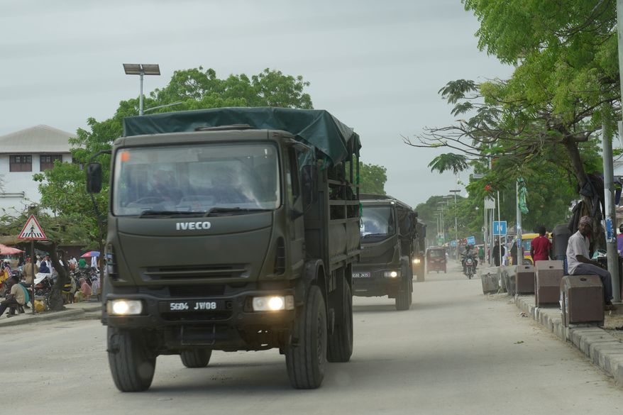 FILE - Tanzania Army patrol the street during vote counting in Zanzibar, Tanzania, Friday, Oct. 31, 2025. (AP Photo/Brian Inganga, File)