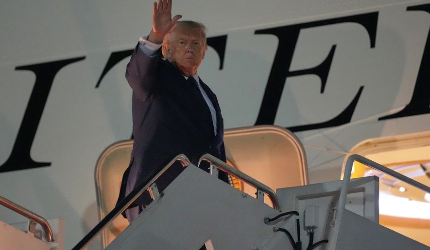 President Donald Trump waves as he boards Air Force One, Monday, July 6, 2026, at Joint Base Andrews, Md. (AP Photo/Alex Brandon)