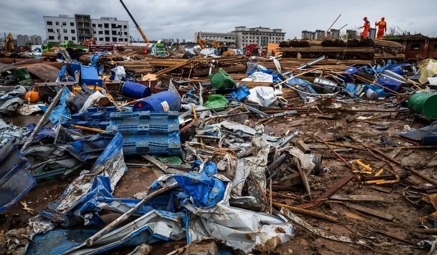 In this photo released by Xinhua News Agency, rescuers conduct work at a tornado-hit logistics park in Huangzhou District of Huanggang City in central China's Hubei Province on Tuesday, July 7, 2026. (Wu Zhizun/Xinhua via AP)