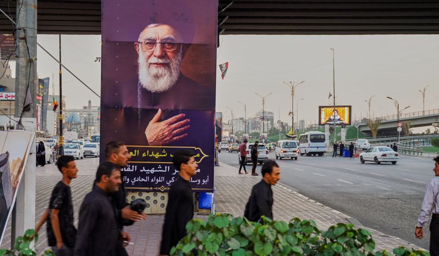 Posters of Khamenei are displayed along the main streets ahead of the funeral ceremony for Iran's former leader Ali Khamenei, who was killed in the U.S.-Israeli attacks in Najaf, Iraq, Tuesday, July 7, 2026. (AP Photo/Anmar Khalil)