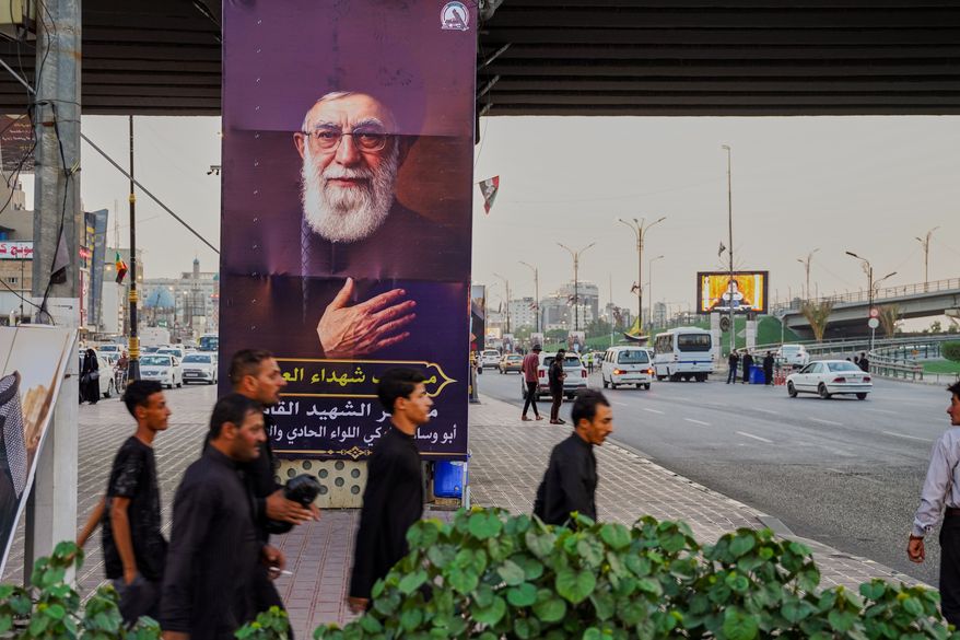 Posters of Khamenei are displayed along the main streets ahead of the funeral ceremony for Iran's former leader Ali Khamenei, who was killed in the U.S.-Israeli attacks in Najaf, Iraq, Tuesday, July 7, 2026. (AP Photo/Anmar Khalil)
