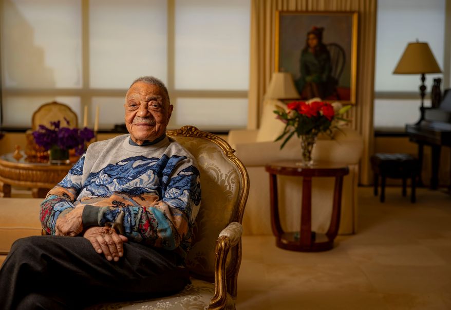 George E. Johnson Sr. sits in his Chicago home Tuesday, Feb. 18, 2025. (Brian Cassella/Chicago Tribune via AP)