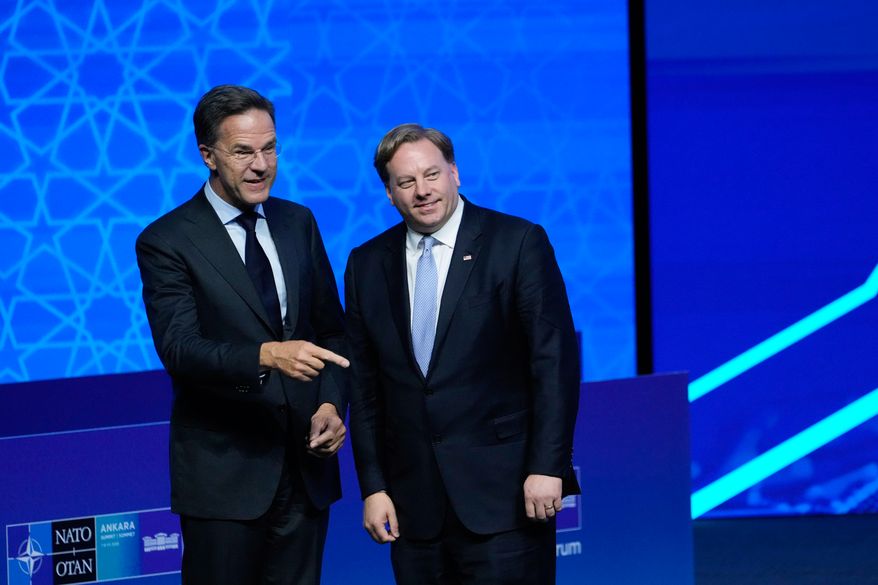 NATO Secretary-General Mark Rutte, left, speaks with U.S. Under Secretary of Defense for Acquisition and Sustainment Michael Duffey, during the NATO Defense Industry Forum at the NATO summit in Ankara, Turkey, Tuesday, July 7, 2026. (AP Photo/Hussein Malla)