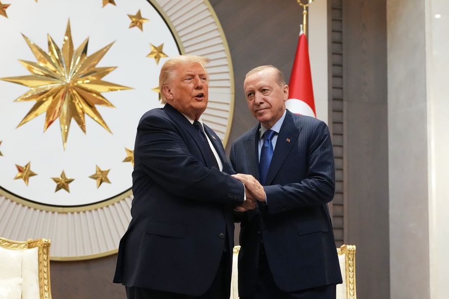 President Donald Trump shakes hands with Turkish President Recep Tayyip Erdogan upon arriving for the NATO summit in Ankara, Turkey, Tuesday, July 7, 2026. (AP Photo/Alex Brandon)