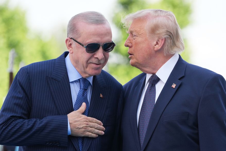 President Donald Trump speaks with Turkish President Recep Tayyip Erdogan at the Bestepe Presidential Palace during a formal welcome for the NATO summit in Ankara, Turkey, Tuesday, July 7, 2026.(AP Photo/Alex Brandon)