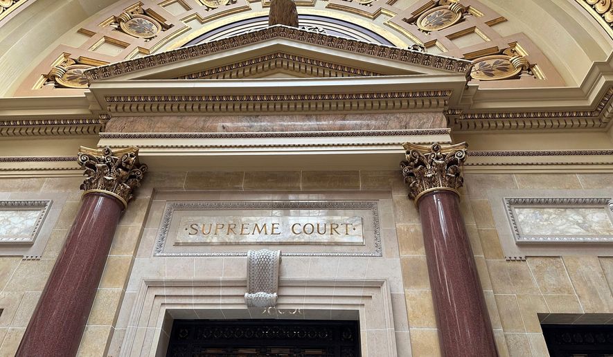 FILE - The entrance to the Wisconsin Supreme Court chambers is seen in the state Capitol in Madison, Wis., March 14, 2024. (AP Photo/Todd Richmond, File)