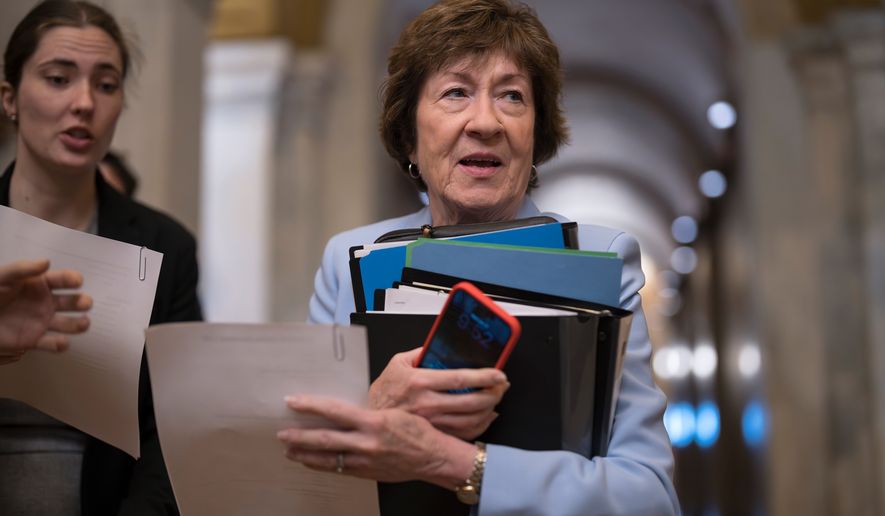 Sen. Susan Collins, R-Maine, a member of the Senate Intelligence Committee, arrives at the Capitol after President Donald Trump said he was delaying Jay Clayton's nomination to lead the U.S. intelligence community, in Washington, Wednesday, June 17, 2026. (AP Photo/J. Scott Applewhite)