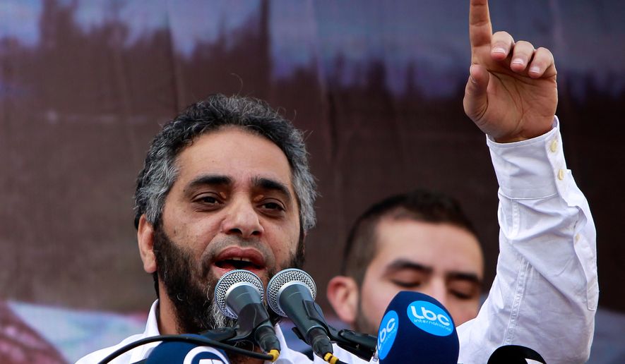 FILE - Lebanese pop idol Fadel Shaker delivers a sermon in support of Syrian rebel fighters and Syrian refugees after the Friday prayer, Feb. 8, 2013, in Beirut. (AP Photo/Bilal Hussein, File)