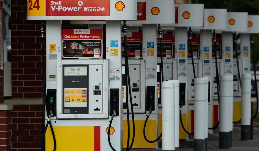 Gas pumps are seen at a gas station in Buffalo Grove, Thursday, June 25, 2026. (AP Photo/Nam Y. Huh)