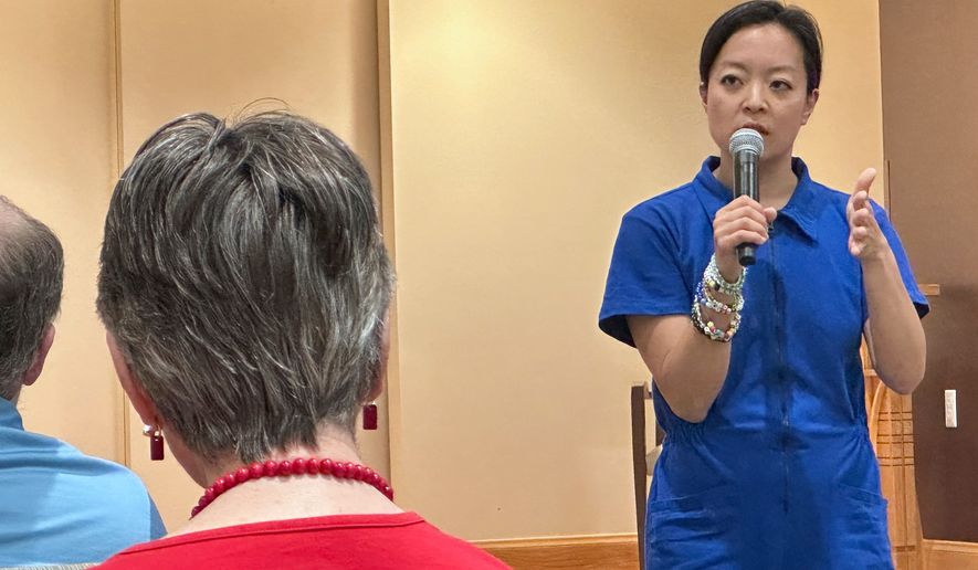 Francesca Hong, a Democratic socialist candidate for Wisconsin governor, speaks to voters at a retirement home, Tuesday, July 7, 2026, in Madison, Wis. (AP Photo/Scott Bauer)
