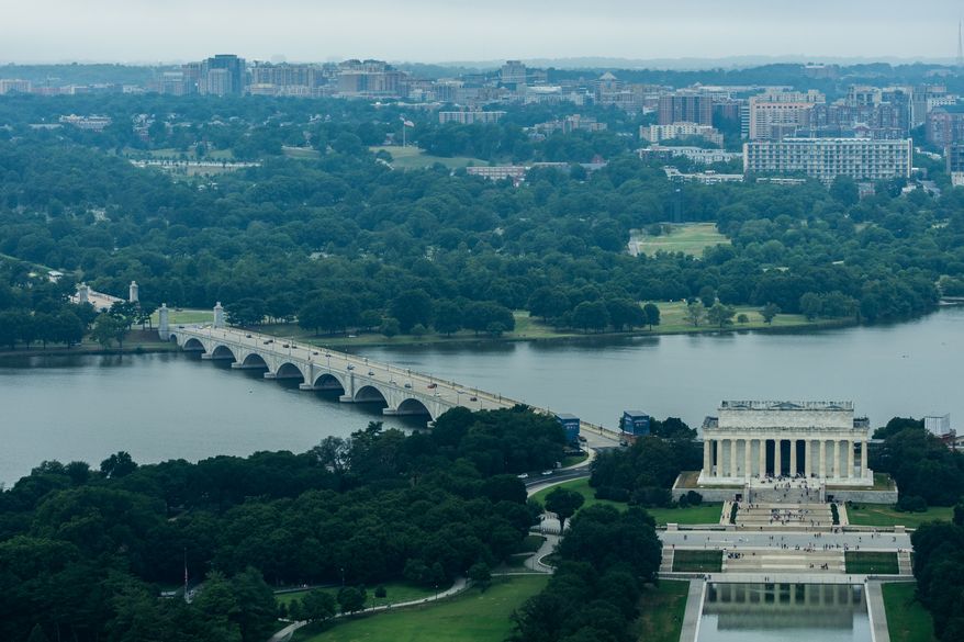 Memorial Circle, where President Donald Trump has proposed building an arch to commemorate the United States' 250th anniversary, the Arlington Memorial Bridge and the Lincoln Memorial are seen from the Washington Monument, Thursday, July 9, 2026, in Washington. (AP Photo/Julia Demaree Nikhinson)