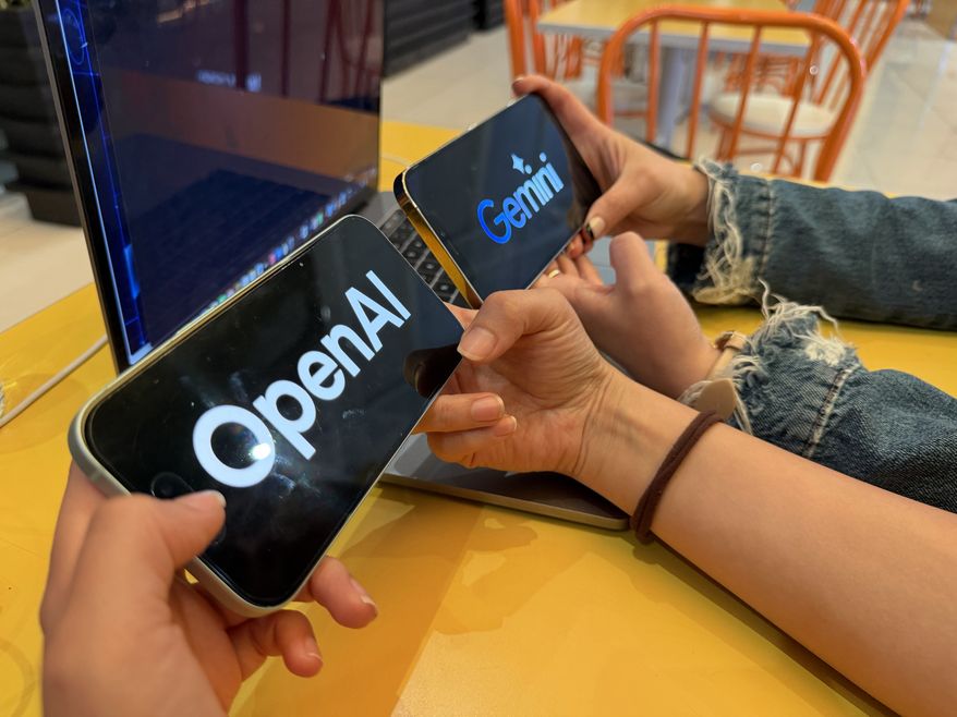 Two people hold two smartphones side by side, one displaying the OpenAI logo and the other displaying the Google Gemini logo. File photo credit: Daniel Constante via Shutterstock.