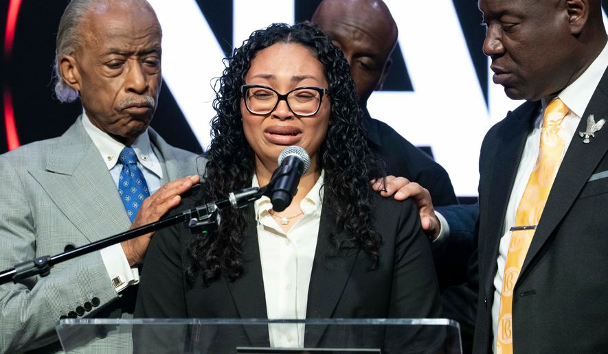 Christine Wonsley, mother of Nolan Xavier Wells, reacts as she speaks during a news conference at National Action Network headquarters, Friday, July 10, 2026, in New York. (AP Photo/Yuki Iwamura)