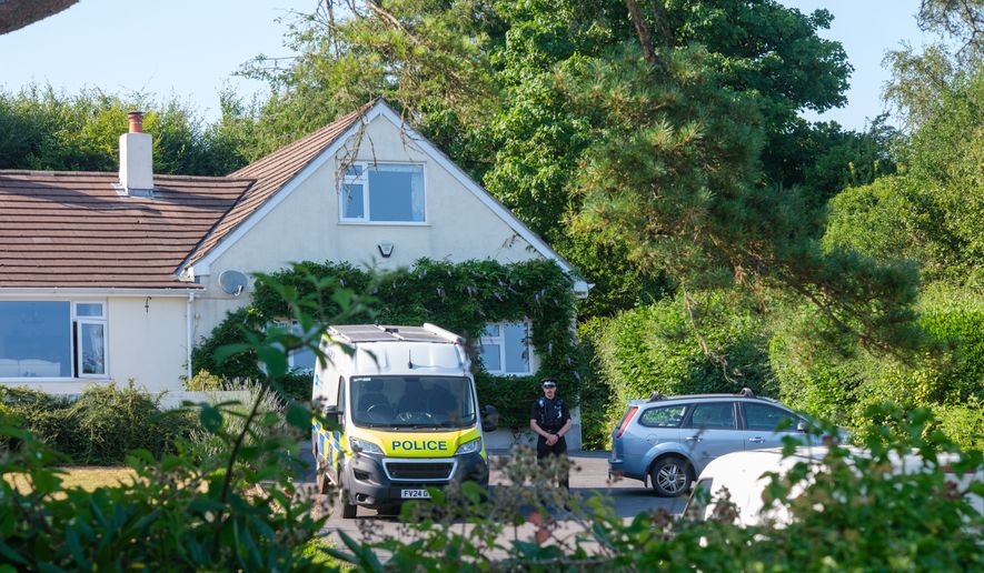 Police outside the house of former lawmaker Ann Widdecombe, in Haytor, England, Friday July 10, 2026, after she was found dead in her home on Thursday with serious injuries. (Matt Keeble/PA via AP)
