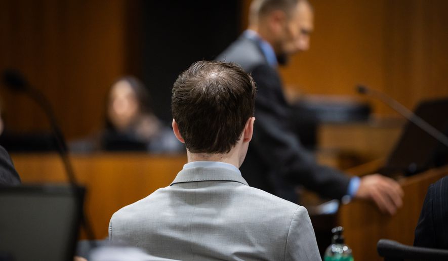 Tyler Robinson, accused in the fatal shooting of Charlie Kirk, listens as Deputy Utah County Attorney Ryan McBride speaks during a preliminary hearing at the 4th District Court in Provo, Utah, Friday, July 10, 2026. (Tess Crowley/The Deseret News via AP, Pool)