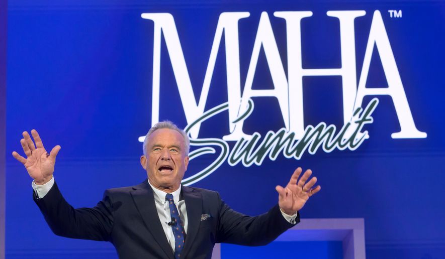 Health and Human Services Secretary Robert F. Kennedy, Jr., arrives on stage at the inaugural Make America Healthy Again summit in Washington on Nov. 12, 2025. (AP Photo/Rod Lamkey Jr.) **FILE**