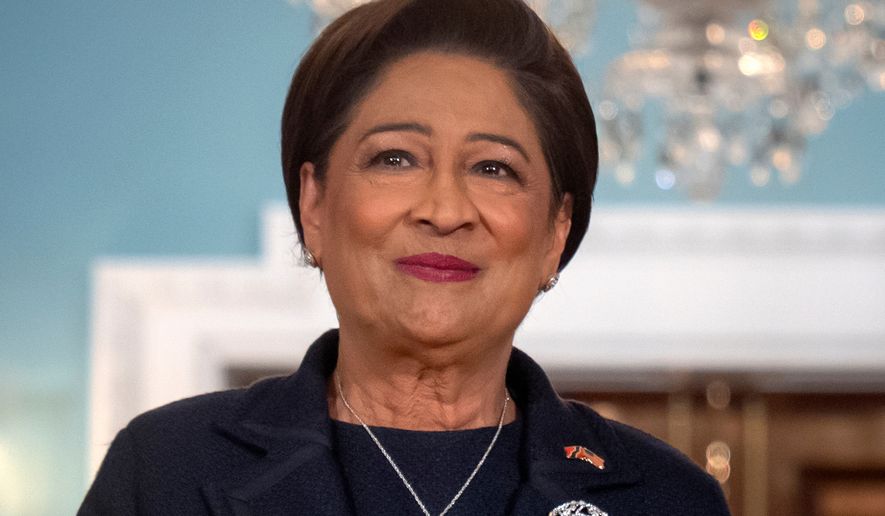 Trinidad and Tobago Prime Minister Kamla Persad-Bissessar stands at the State Department in Washington, Sept. 30, 2025. (AP Photo/Mark Schiefelbein, File)