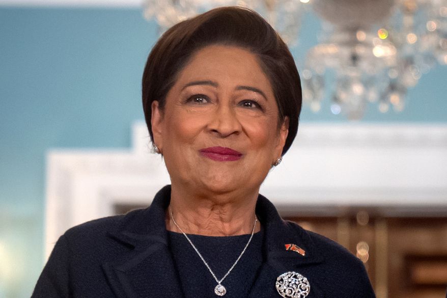 Trinidad and Tobago Prime Minister Kamla Persad-Bissessar stands at the State Department in Washington, Sept. 30, 2025. (AP Photo/Mark Schiefelbein, File)