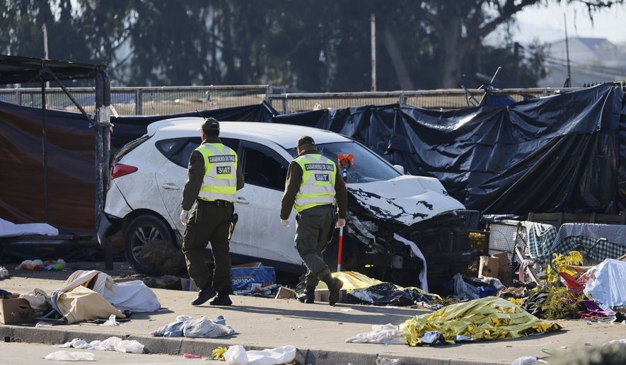 Police inspect a car after it struck a crowd at an open-air market in Vina del Mar, Chile, Sunday, July 12, 2026. (Sebastian Cisterna/ATON via AP)
