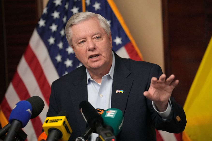 U.S. Sen. Lindsey Graham, R-S.C., gestures as he speaks to the media in Kyiv, Ukraine, March 18, 2024. (AP Photo/Vadim Ghirda, File)