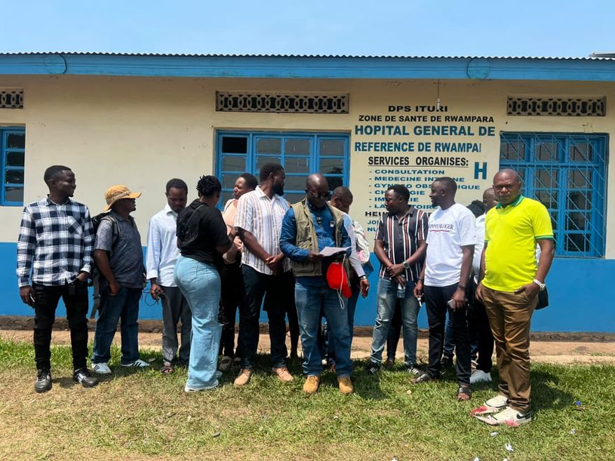 Workers at an Ebola treatment center go on strike over unpaid salaries and bonuses at Rwampara General Hospital, in Ituri, northeastern Congo, Monday, July 13, 2026, (AP Photo/Prosper Heri Ngorora)