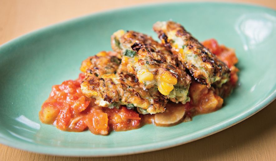 This image released by Voracious shows a recipe for summer vegetable scallion pancakes from the cookbook “Deep Run Roots” by Vivian Howard. (Rex Miller/Voracious via AP)
