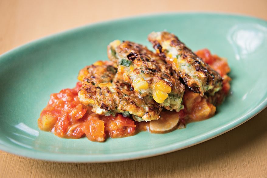 This image released by Voracious shows a recipe for summer vegetable scallion pancakes from the cookbook “Deep Run Roots” by Vivian Howard. (Rex Miller/Voracious via AP)