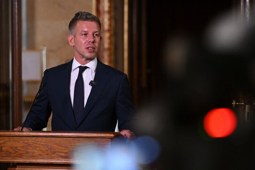 Hungarian Prime Minister Peter Magyar holds an extraordinary press briefing following a voting on the 17th amendment to the Fundamental Law in the parliament building in Budapest, Hungary, Monday, July 13, 2026. (Tamas Purger/MTI via AP)