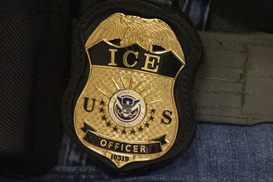 A federal agent wears an Immigration and Customs Enforcement badge in New York on June 10, 2025. (AP Photo/Yuki Iwamura) **FILE**