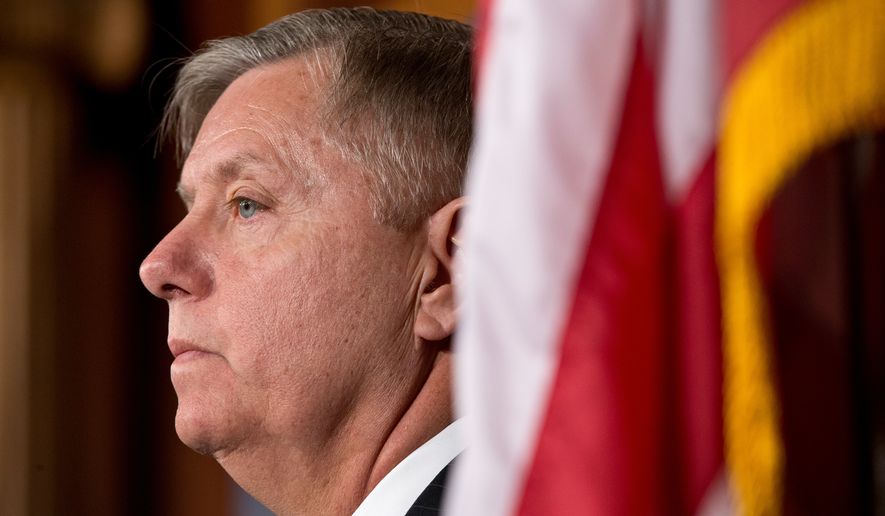 FILE - Sen. Lindsey Graham, R-S.C., listens during a Capitol Hill news conference in Washington, March 6, 2013. (AP Photo/J. Scott Applewhite, File)