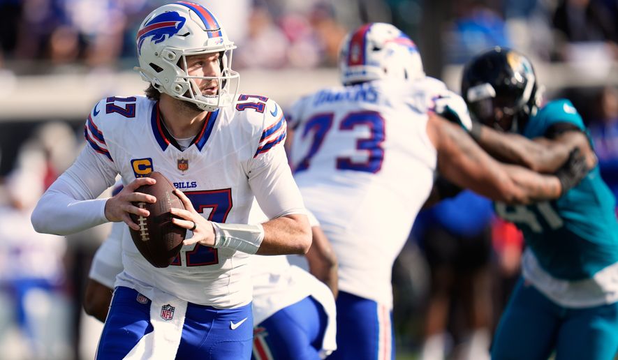 FILE - Buffalo Bills quarterback Josh Allen (17) looks for a receiver during the second half of an NFL wild card playoff football game against the Jacksonville Jaguars, Jan. 11, 2026, in Jacksonville, Fla. (AP Photo/John Raoux, File)