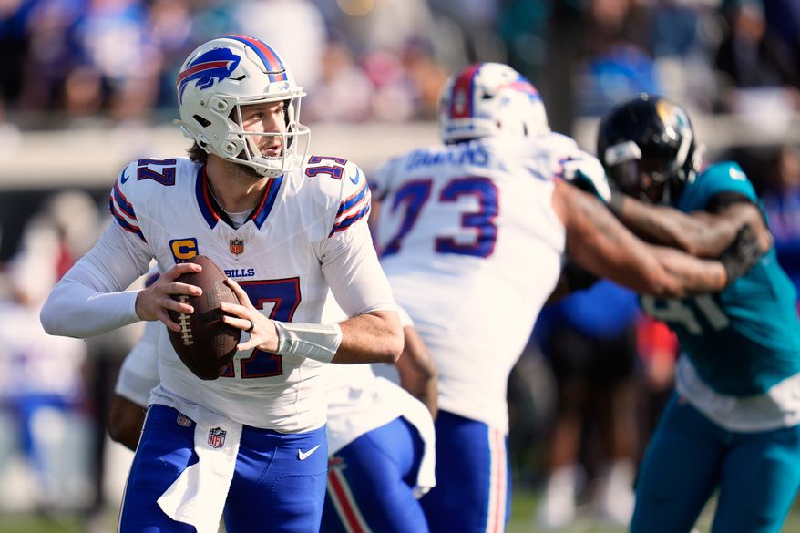 FILE - Buffalo Bills quarterback Josh Allen (17) looks for a receiver during the second half of an NFL wild card playoff football game against the Jacksonville Jaguars, Jan. 11, 2026, in Jacksonville, Fla. (AP Photo/John Raoux, File)