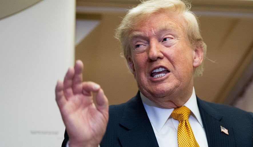 President Donald Trump speaks with reporters in flight on Air Force One after landing at U.S. Air Force Base at RAF Mildenhall, in Suffolk Eastern England, Wednesday, July 8, 2026. (AP Photo/Alex Brandon)