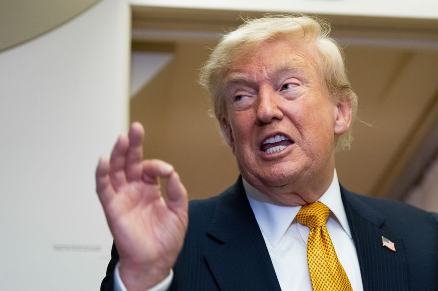 President Donald Trump speaks with reporters in flight on Air Force One after landing at U.S. Air Force Base at RAF Mildenhall, in Suffolk Eastern England, Wednesday, July 8, 2026. (AP Photo/Alex Brandon)
