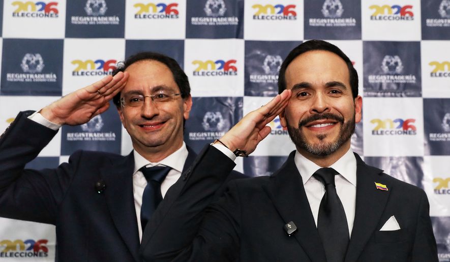 Independent presidential candidate Abelardo de la Espriella, right, and his running mate Jose Manuel Restrepo salute as they present their ticket in Cali, Colombia, Thursday, March 12, 2026. (AP Photo/Santiago Saldarriaga)
