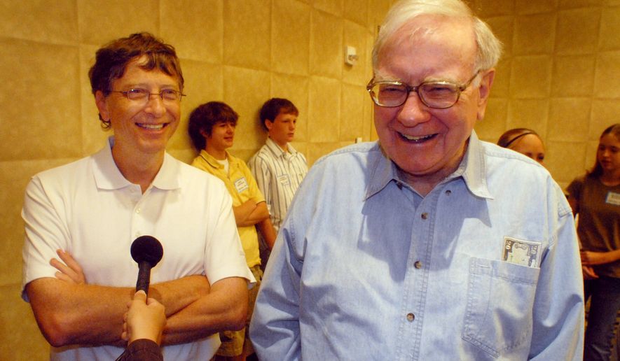 FILE - Microsoft co-founder and chairman Bill Gates, left, and Berkshire Hathaway Inc. billionaire Warren Buffett laugh while answering questions Aug 5, 2006, before the Nebraska Regional Bridge tournament in Council Bluffs, Iowa. (AP Photo/Dave Weaver, File)
